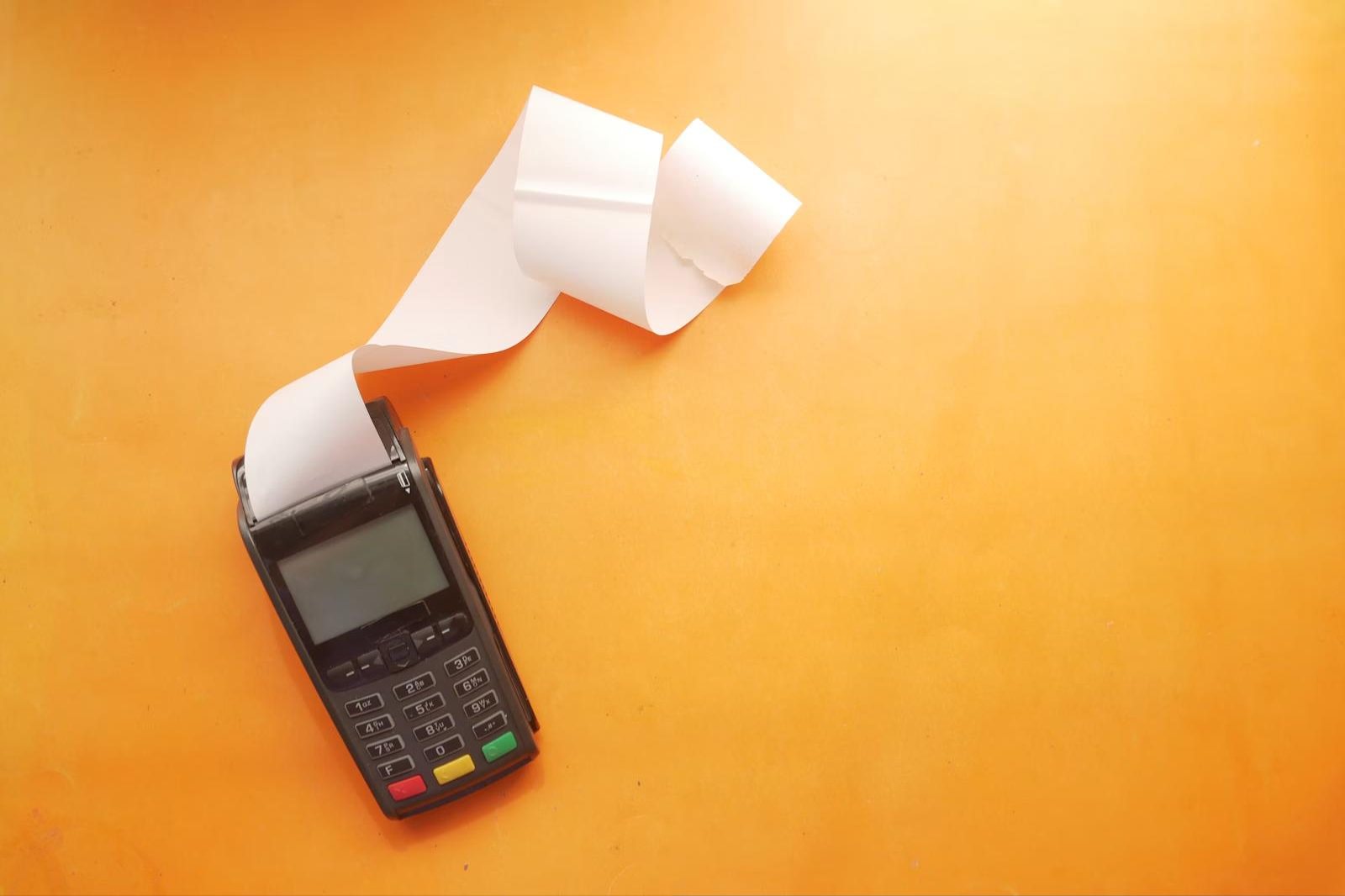 Payment terminal printing a long receipt